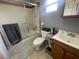 Clean bathroom with shower/tub combo, vanity, and plenty of storage at 6228 Dartle St, Las Vegas, NV 89130