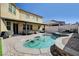 Enjoy outdoor living at its finest with a private pool and spacious patio at 677 Coastal Lagoon St, Henderson, NV 89002