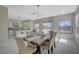 Bright dining area with a rustic wooden table and seating for six at 5513 Mustang St, Las Vegas, NV 89130