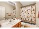 Charming bathroom with whimsical shower curtain at 7310 Heggie Ave, Las Vegas, NV 89131