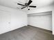 Spacious bedroom featuring a ceiling fan and built-in closet at 6609 Pepperidge Way, Las Vegas, NV 89108