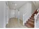 Light entryway with tile floor and stairs at 1232 Alford Creek Ct, North Las Vegas, NV 89031