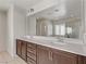 Double vanity bathroom with large mirror at 1232 Alford Creek Ct, North Las Vegas, NV 89031