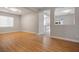 Living room with hardwood floors and view of kitchen at 8331 Martinborough Ave, Las Vegas, NV 89131