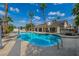 Stunning freeform pool with spacious deck and backyard views at 2250 Bowie Cir, Henderson, NV 89014