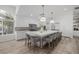 Large kitchen island with seating and modern white cabinetry at 2250 Bowie Cir, Henderson, NV 89014