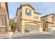 Two-story home with attached garage at 4363 Acropolis Ave, North Las Vegas, NV 89031