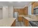 Kitchen with light wood cabinets, stainless steel appliances, and an island at 4363 Acropolis Ave, North Las Vegas, NV 89031