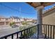 Balcony view of neighborhood homes and a street at 6229 Mustang Spring Ave, Las Vegas, NV 89139