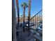 View from the stairs showing parking lot and palm trees at 2004 Mesquite Ln # 201, Laughlin, NV 89029