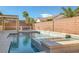 Resort style pool and spa with water feature at 9524 Grand Grove Ct, Las Vegas, NV 89149