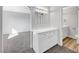 Bright bathroom with white vanity, updated countertop, and modern fixtures at 3791 El Camino Rd, Las Vegas, NV 89103