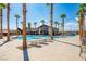 Large community pool with lounge chairs and a clubhouse at 6760 Millbury St, North Las Vegas, NV 89086