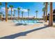 Resort-style pool with palm trees and a relaxing atmosphere at 6760 Millbury St, North Las Vegas, NV 89086