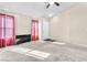 Living room with hardwood floors and red curtains at 2846 Mount Hope Dr, Las Vegas, NV 89156