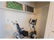 Laundry room with exercise bike and shelving at 5261 Carriellen Ln, Las Vegas, NV 89110