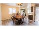 Dining area with a table, chairs and kitchen access at 5261 Carriellen Ln, Las Vegas, NV 89110