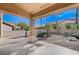 Covered patio overlooking the backyard and desert landscape at 10309 Marymont Pl, Las Vegas, NV 89134