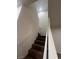 Clean carpeted staircase with simple white railing at 1198 Narrow Gorge Ct, Henderson, NV 89002