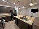 Modern kitchen with stainless steel appliances and granite countertops at 1198 Narrow Gorge Ct, Henderson, NV 89002