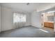 Bedroom with gray carpet and en-suite bathroom at 518 Feliz Contado Ct, Henderson, NV 89015