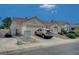 One-story home with a two-car garage and neatly landscaped yard at 518 Feliz Contado Ct, Henderson, NV 89015