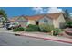 One-story home featuring a two-car garage and desert landscaping at 518 Feliz Contado Ct, Henderson, NV 89015