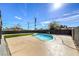 Inviting kidney-shaped pool with a large patio area at 5509 Balzar Ave, Las Vegas, NV 89108