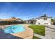 Relaxing kidney-shaped pool in a sunny backyard at 5509 Balzar Ave, Las Vegas, NV 89108