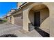 Front entry with arched alcove and a bench at 2796 Sipe Springs St, Las Vegas, NV 89142