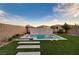 Modern pool and spa with waterfall feature at 366 Spotted Dove St, Las Vegas, NV 89138