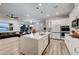 Modern kitchen with white cabinets, large island, and gold accents at 366 Spotted Dove St, Las Vegas, NV 89138