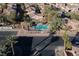 Community pool and surrounding neighborhood from above at 1477 Summer Glow Ave, Henderson, NV 89012