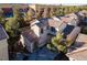 Aerial view of a two-story house and its surroundings at 1477 Summer Glow Ave, Henderson, NV 89012