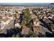 Aerial view of neighborhood with homes and trees at 1477 Summer Glow Ave, Henderson, NV 89012