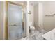 Bathroom featuring a shower stall, toilet, and marble-tiled floor at 2148 Camel Mesa Dr, Laughlin, NV 89029