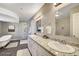 Elegant bathroom with double vanity, soaking tub, and walk-in shower at 6885 Coley Ave, Las Vegas, NV 89146