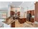 Large kitchen with granite countertops, stainless steel appliances, and an island at 164 Glenbrook Estates Dr, Las Vegas, NV 89183