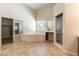 Large bathroom with soaking tub, shower, and walk-in closet at 164 Glenbrook Estates Dr, Las Vegas, NV 89183