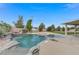 Relaxing kidney-shaped pool with rock waterfall feature at 4591 Borrego Springs Way, Las Vegas, NV 89129