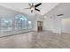 Bright and airy living room with high ceilings and ceiling fan at 4591 Borrego Springs Way, Las Vegas, NV 89129