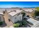 Single-story house with tile roof and desert landscaping at 2417 Rock Pigeon Ave, North Las Vegas, NV 89084