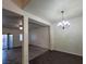 Elegant dining room features a beautiful chandelier and ample space at 4116 Mattray St, North Las Vegas, NV 89032