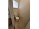 Small half bathroom with toilet at 6848 Mesita Ave, Las Vegas, NV 89122