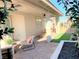 Outdoor patio with seating and access to grassy area at 107 Orchestral Ln, Henderson, NV 89011