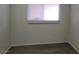 Bright bedroom with wood-look flooring and a window at 309 Rossmoyne Ave, North Las Vegas, NV 89030