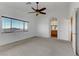 Main bedroom with ceiling fan and ensuite bathroom at 6920 Winter Ridge St, Las Vegas, NV 89149