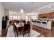 Spacious dining area with hardwood floors and open floor plan at 3893 Burma Rd, North Las Vegas, NV 89032