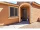 Inviting entryway with arched doorway and stone accents at 3893 Burma Rd, North Las Vegas, NV 89032