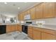 Spacious kitchen with ample cabinetry, modern appliances, and tiled flooring at 4230 Cascada Piazza Ln, Las Vegas, NV 89135